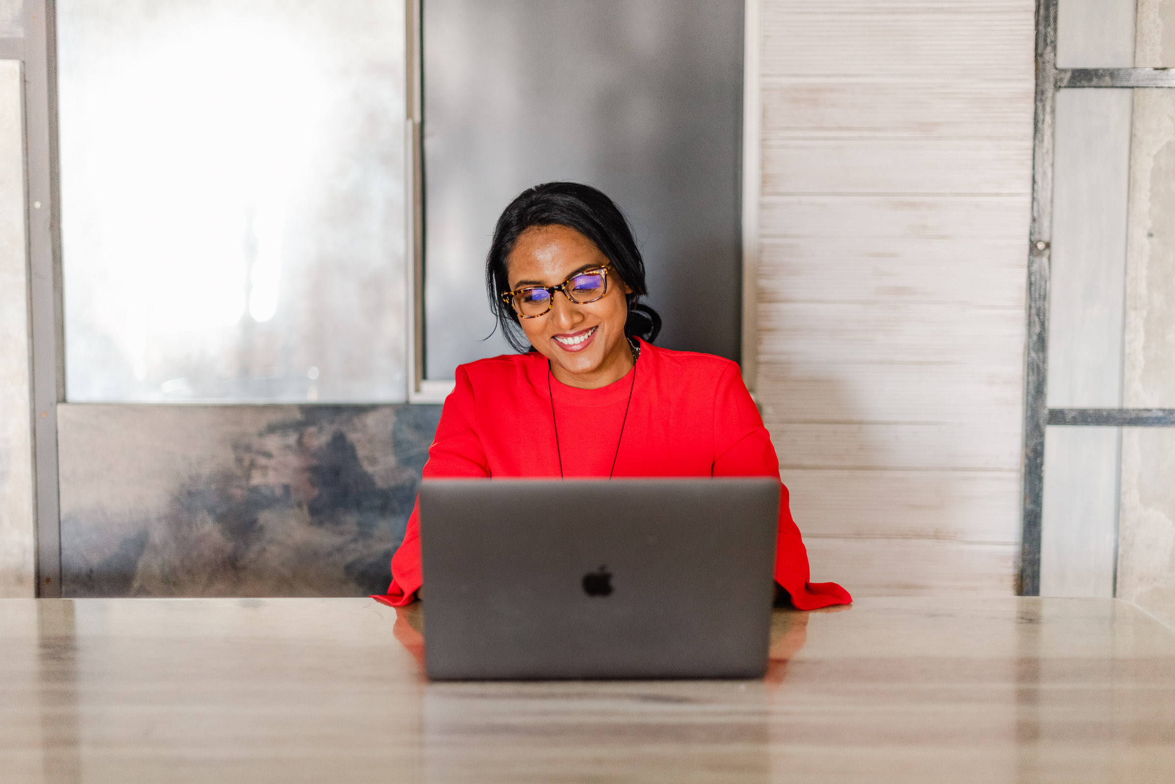 Divya teaching live on her laptop