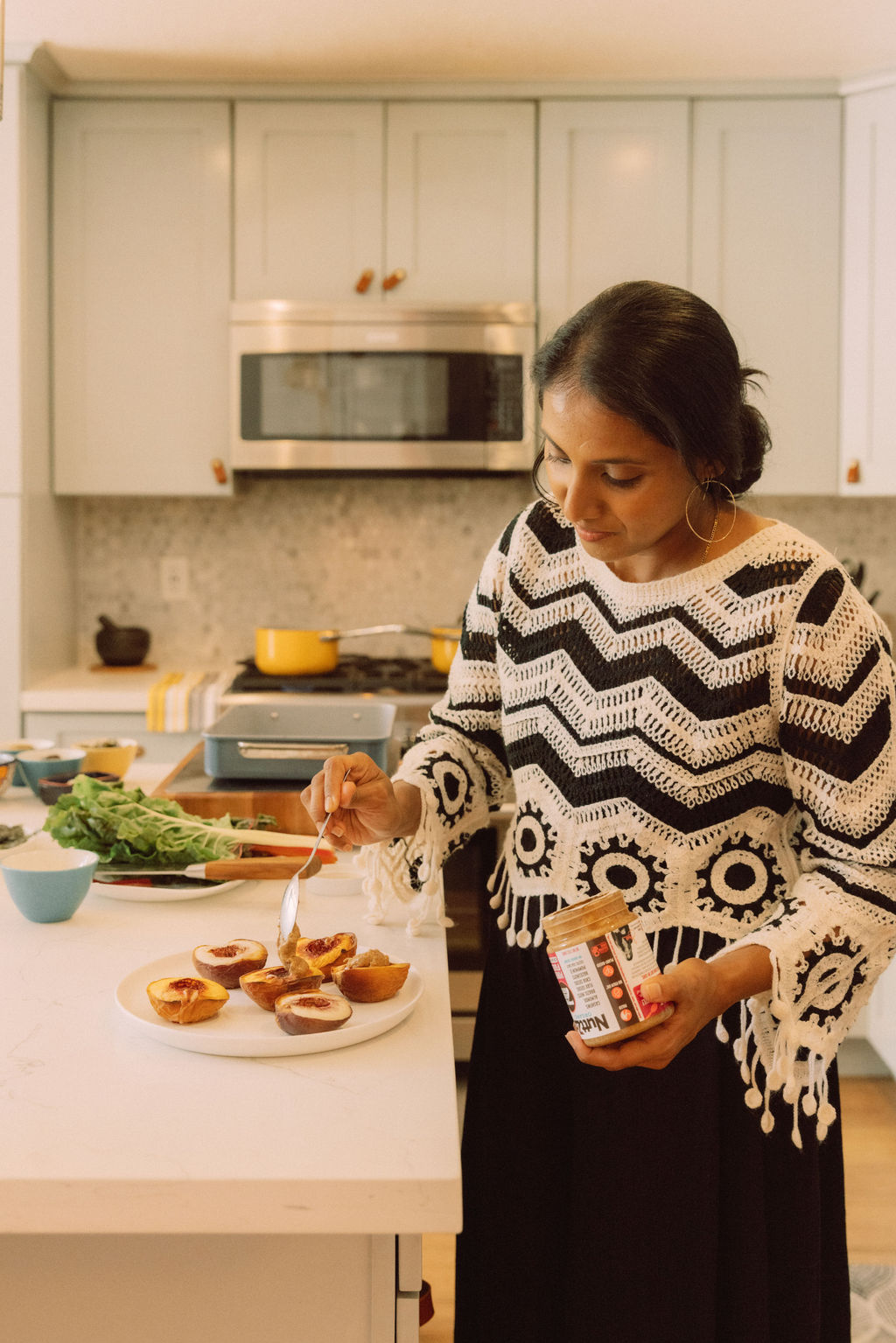 Divya preparing food in the kitchen